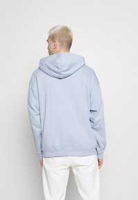 Weekday Sweatshirt com capuz - light blue