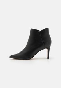 Bottines à talons hauts - black