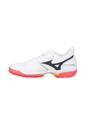White athletic shoe with a black logo, breathable mesh upper, textured design, and a pink rubber outsole with yellow accents.