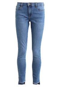 Úzké džíny ze světle modrého denimu, s středním pasem, klasickým pětinásobným designem kapes a roztrhaným lemem u kotníků.