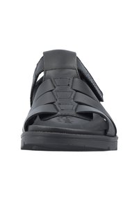 Sandale en cuir noir avec plusieurs larges sangles, fermeture velcro ajustable à la cheville et semelle rembourrée. Visez le confort et la durabilité.