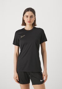 Nike Performance TOP BRANDED - Spordi T-särk - black/metallic gold