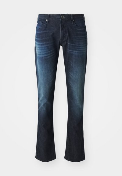 Dunkelblaue Jeans aus Denim mit geradem Bein, mit subtilen Verblassungen, Gürtelschlaufen und Fronttaschen. Klassischer Knopf- und Reißverschluss.