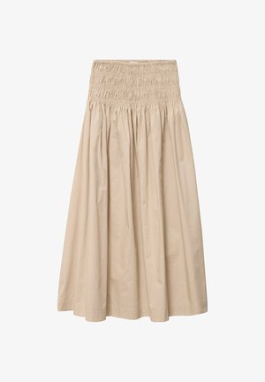 Jupe longue beige avec ceinture haute élastiquée et froncée, et panneaux de tissu fluides couvrant toute la longueur.