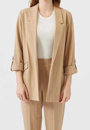 Halflange jas - beige