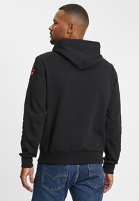 Rossignol HERO  - Bluza z kapturem