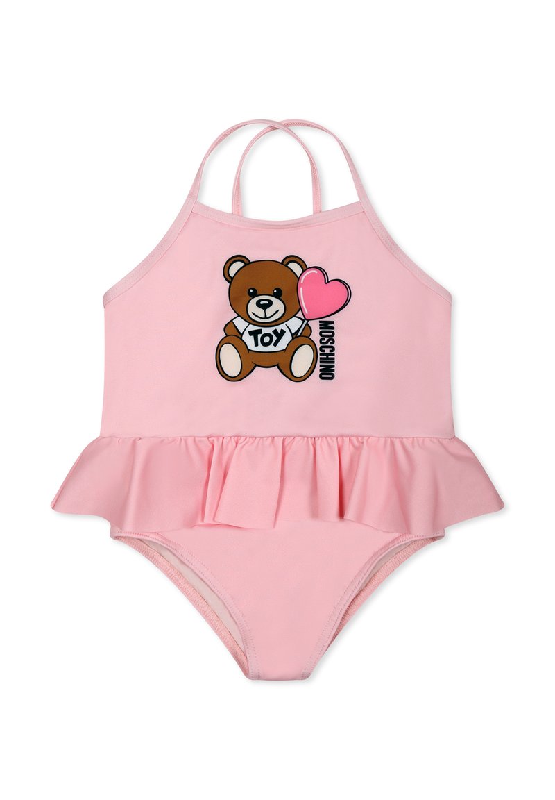 Costume da bagno rosa con fondo arricciato, caratterizzato da una grafica con un orsetto, il testo "TOY" e un cuore, progettato con spalline regolabili.
