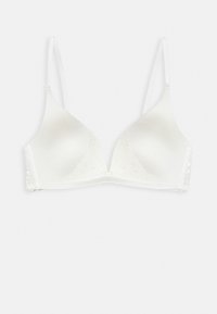 Senza cuciture bianco con pizzo, presenta coppe a triangolo, spalline regolabili e una chiusura a gancio sul retro.