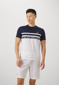 Lacoste Sport - T-SHIRT TC - Sports T-shirts - white/navy blue Miniaturebillede 1