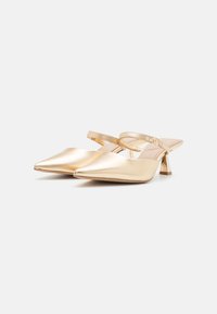 ALDO TAWM - Mules à talons - gold