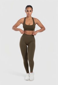 Smilodox LEGGINGS INVISIBLE SCRUNCH SEAMLESS ELIN - Tights - khaki