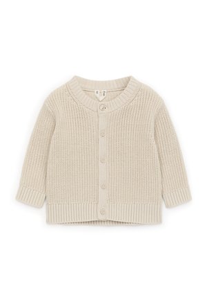 Beżowy dziany sweterek dziecięcy z długimi rękawami, okrągłym dekoltem, zapięciem na guziki z przodu oraz ściągaczami przy mankietach i dole.