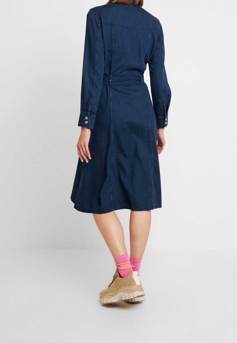 monki denim wrap dress MONKI Black denim mini wrap dress with contrast