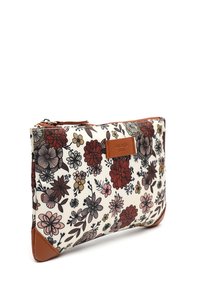 Kukkaistykitys pussi, jossa valkoinen tausta, ruskeat nahkakoristeet ja vetoketjukiinnitys. Sisältää eri kukkakuoseja punaisina, vaaleanpunaisina ja vihreinä.