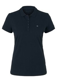 Mörkblå pikétröja i bomull. Har en klassisk krage, korta ärmar, knappslå och en liten logotyp på bröstet.