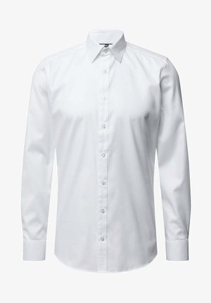 Camicia bianca a maniche lunghe con bottoni, realizzata in tessuto liscio, dotata di colletto classico, taglio dritto e leggero lucido. I bottoni sono bianchi e ben distanziati.