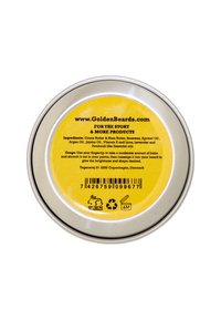 Metallburk med en glänsande silverfinish och en ljusgul etikett. Etiketten listar ingredienser och bruksanvisning, med återvinningssymboler på sidan.