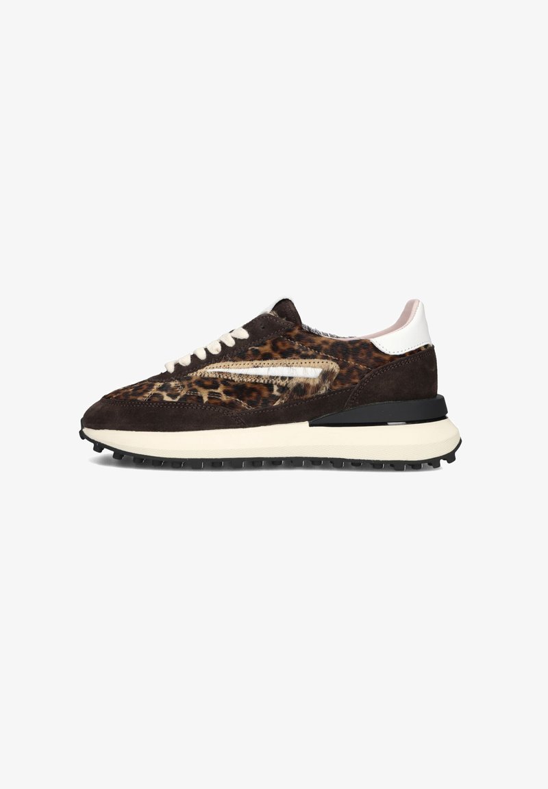 Brown suede sneakers featuring a leopard print design, white accent on the heel, and a thick black rubber sole.