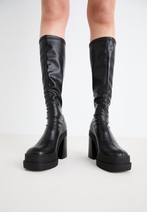 High heeled boots - black
