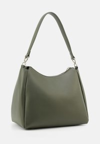 Green leather handbag featuring a soft, rounded design, a single shoulder strap, and a zip closure at the top. Smooth texture with minimal accents.