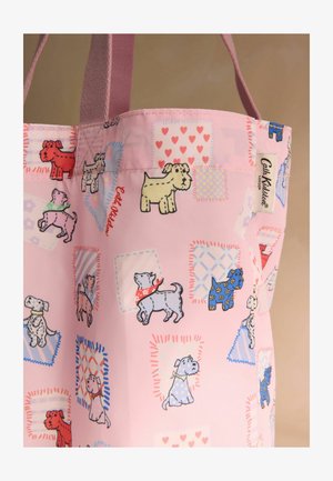 Roosa kandekott, millel on mitmevärvilised koera illustratsioonid ja mustriga ruudud, valmistatud siledast materjalist pehmete ristkülikukujuliste käepidemetega.