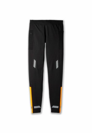 Black athletic leggings with orange accents, reflective details, side pockets, and a fitted design for enhanced mobility and performance.