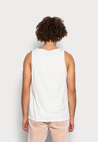 Nudie Jeans RELAXED TANK UNISEX - Top - chalk white
