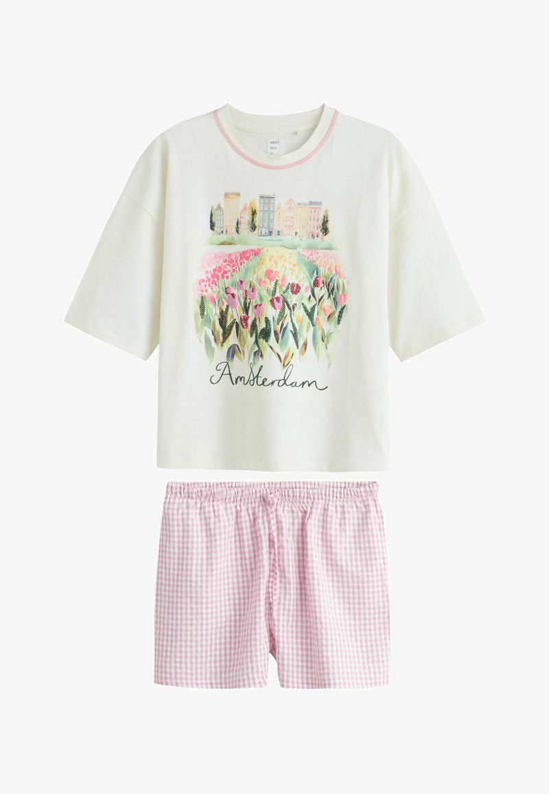 Haut blanc à manches courtes avec imprimé floral et bâtiments d'Amsterdam, associé à un short à taille élastique à carreaux vichy rose et blanc.