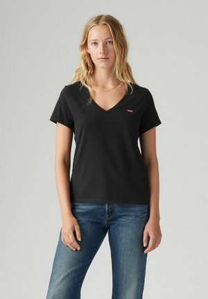 Czarny t-shirt z dekoltem w serek, wykonany z bawełny, z krótkimi rękawami. Posiada małe czerwone logo Levi's na lewej piersi, odpowiedni na codzienne noszenie.