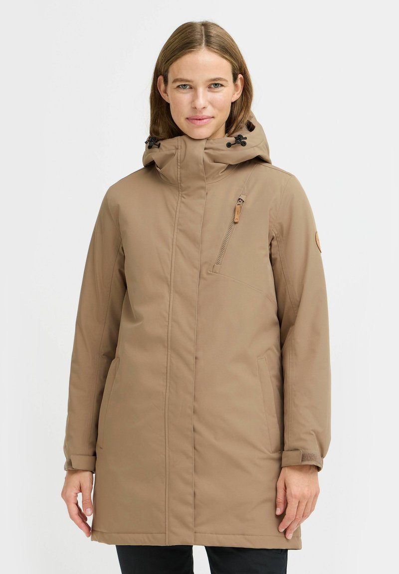Langer beiger Parka mit hohem Kragen und Kapuze. Verfügt über eine mit Reißverschluss verschließbare Brusttasche, Seitentaschen und verstellbare Bündchen. Glatter Stoff.