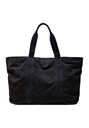 Große schwarze Wildleder-Shopper-Tasche mit zwei Griffen und vertikaler Naht, vor einem schlichten weißen Hintergrund gezeigt.