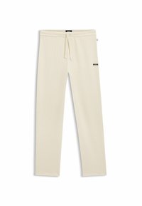 Pantalons de survêtement crème en tissu texturé, avec une taille à cordon de serrage et un logo "BOSS" noir sur la cuisse gauche.