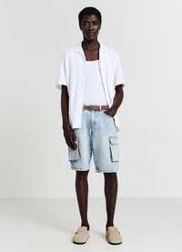Calliope TASCONI CHIARO - Shorts di jeans - blu denim chiaro