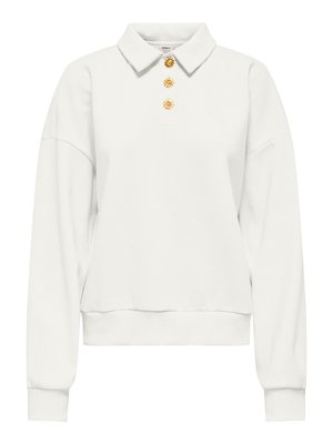 Bílý dlouhý rukáv pulovr s límcem a třemi zlatými knoflíky ve tvaru slunce uprostřed vpředu.