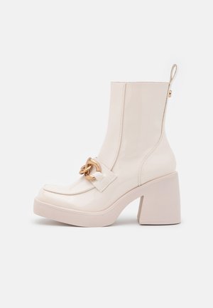 Bottines à plateau - white