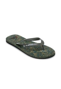 Πράσινη και καφέ σαγιονάρα με σχέδιο, με υφασμένο πάτο και ανθεκτικό γκρι λαστιχένιο λουράκι που φέρει το λογότυπο Quiksilver.