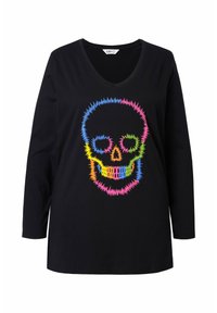 Schwarzes langärmeliges V-Ausschnitt-T-Shirt mit einem mehrfarbigen Totenkopfdesign und Zickzackkanten sowie einer lässigen Passform. Aus weichem Baumwollmaterial.