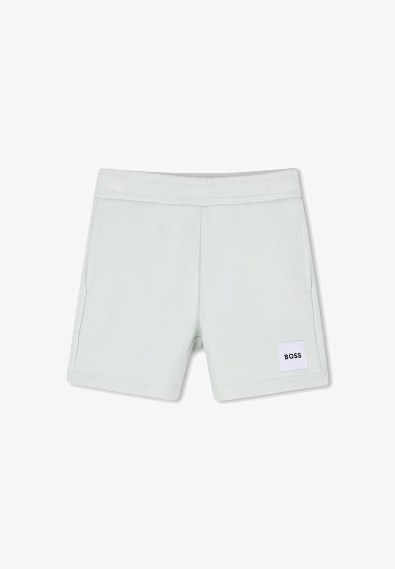 Shorts à taille élastique gris clair avec poches latérales et une petite étiquette blanche portant la mention "BOSS" sur la jambe inférieure gauche.