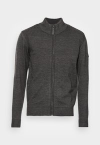 Grijze gebreide cardigan met ritssluiting, met ribbeltextuur, hoge kraag, lange mouwen en zijzakken. Voorzien van een rits aan de voorkant voor sluiting.