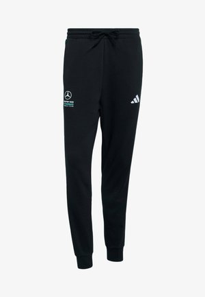 Pantalon de survêtement noir en matériau doux, doté d'une ceinture élastique avec cordon de serrage, et d'accents de logo blanc de Mercedes et Adidas.