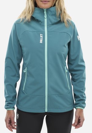 Veste softshell teal avec un col haut, fermeture éclair à l'avant et accents en bleu clair contrastants. Comprend deux poches latérales et un logo sur la poitrine.