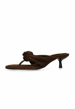 Brown suede heeled sandal with a square toe, thong strap, knotted detail on top, and low black stiletto heel, side view.