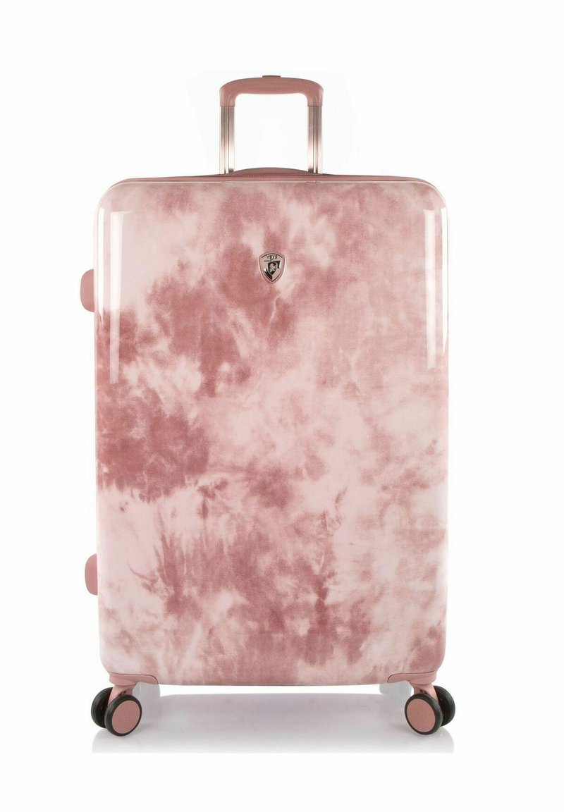 Rosa Batik-Hartschalenkoffer mit glänzender Oberfläche, ausgestattet mit einem ausziehbaren Griff, Rollen und einem Logoaufnäher auf der Vorderseite.