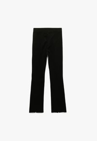 Schwarze, ausgestellte Leggings aus weichem, dehnbarem Stoff mit einem breiten Bund und gespaltenen Akzenten am Saum.