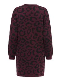 Robe-pull en maille à manches longues avec des taches de léopard noires sur un fond violet foncé, vue de dos.