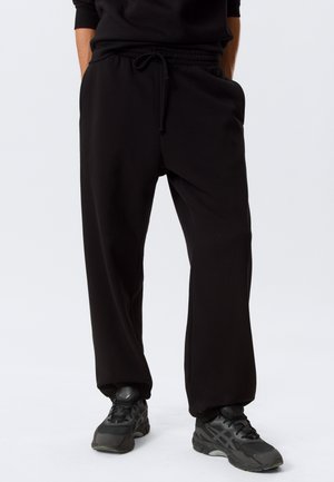 CLASSIC - Verryttelyhousut - black