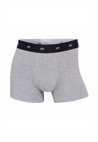 Boxer da uomo grigi realizzati in tessuto misto cotone, con una cintura elastica nera decorata con il logo "CR7" in rilievo e un design aderente.