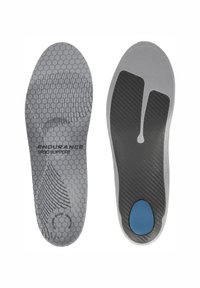 Semelles ergonomiques grises avec une texture en nid d'abeille, dotées d'un contrefort pour le talon et d'un accent bleu sur la surface inférieure pour l'absorption des chocs.