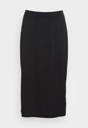 Mustaidist põlvepikkune seelik, mis on valmistatud pehmest ja venivast kangast. Omab elastset vöökohta ja lihtsat, sirget siluetti, ilma taskuteta.