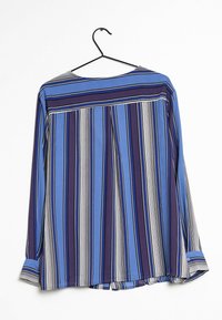Camicia a maniche lunghe con strisce verticali blu e viola, caratterizzata da una scollatura rotonda, spacchi laterali e un dettaglio con polsini abbottonati.